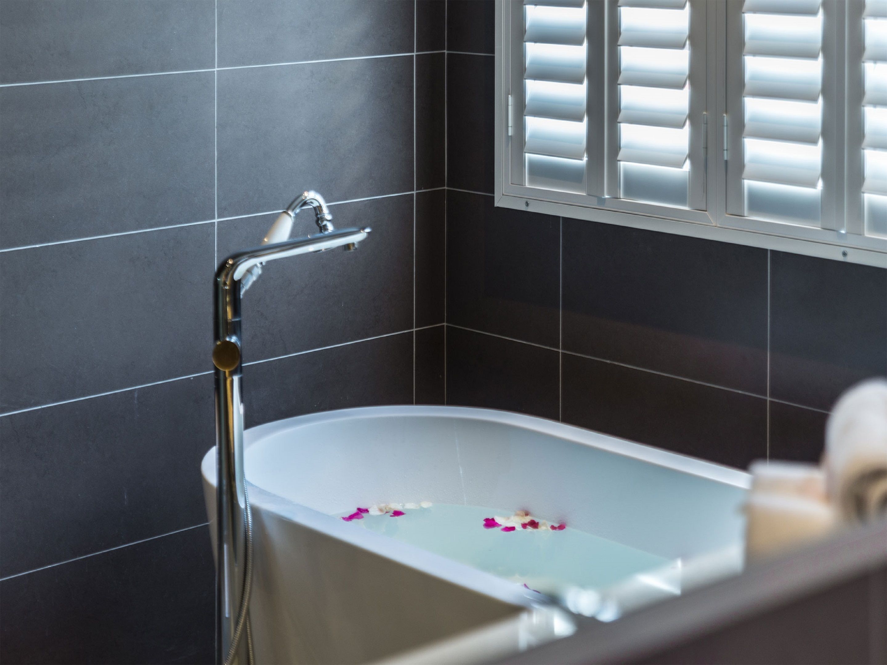 premier suite, 1 king bed, kitchenette | bathroom | hair dryer, towels