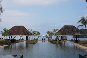 2 outdoor pools, open 9:00 AM to 10:00 PM, pool umbrellas, sun loungers