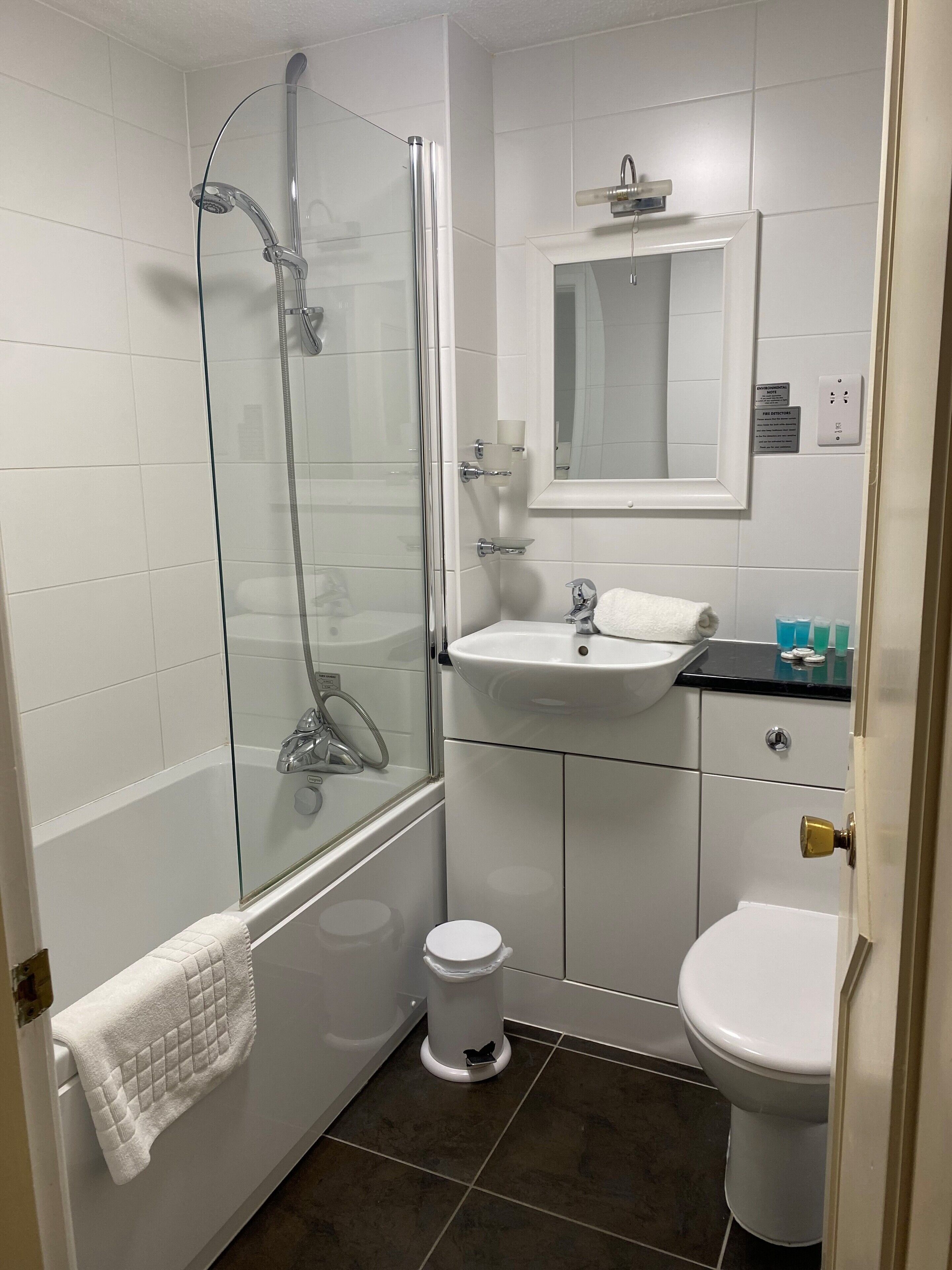 standard room, multiple beds, non smoking | bathroom | deep-soaking bathtub, designer toiletries, hair dryer, towels