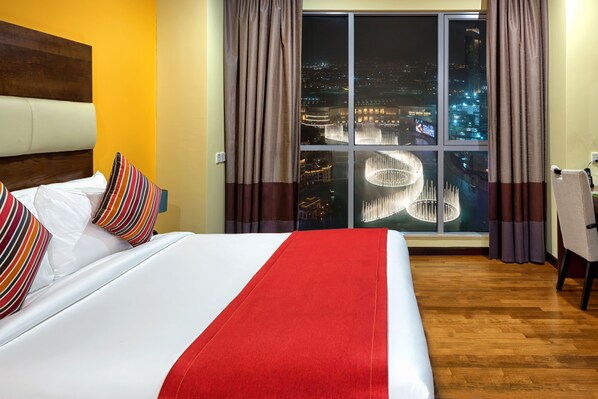 Hypo-allergenic bedding, down duvets, pillow-top beds, minibar