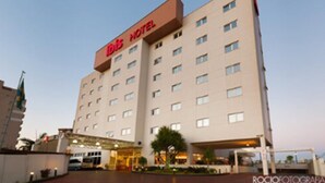 A hotel with a prominent sign reading "Hilton Hotel" and a modern architectural design. - ibis Uberlandia (Uberlandia)