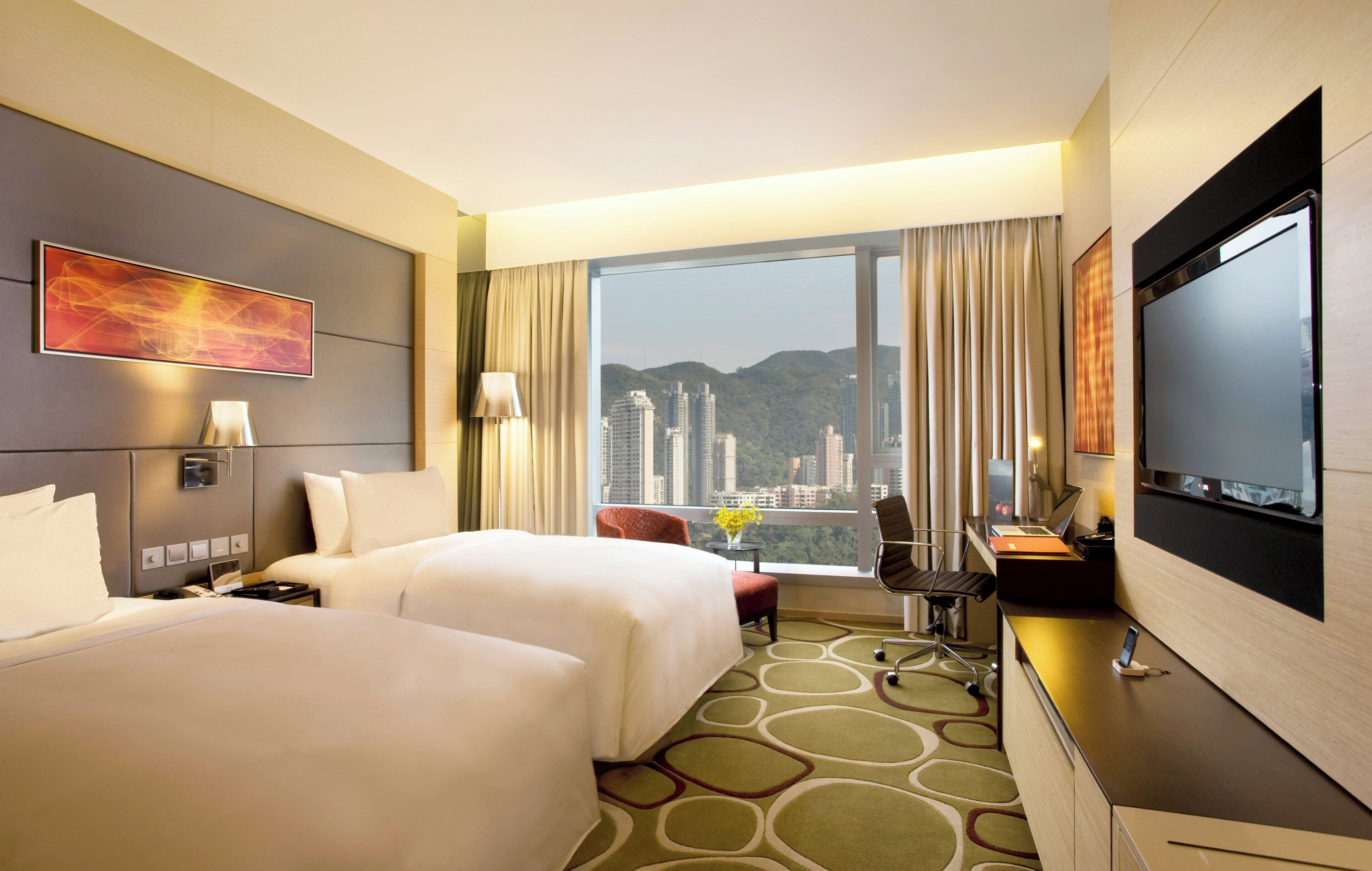 Premium bedding, down duvets, free minibar items, in-room safe