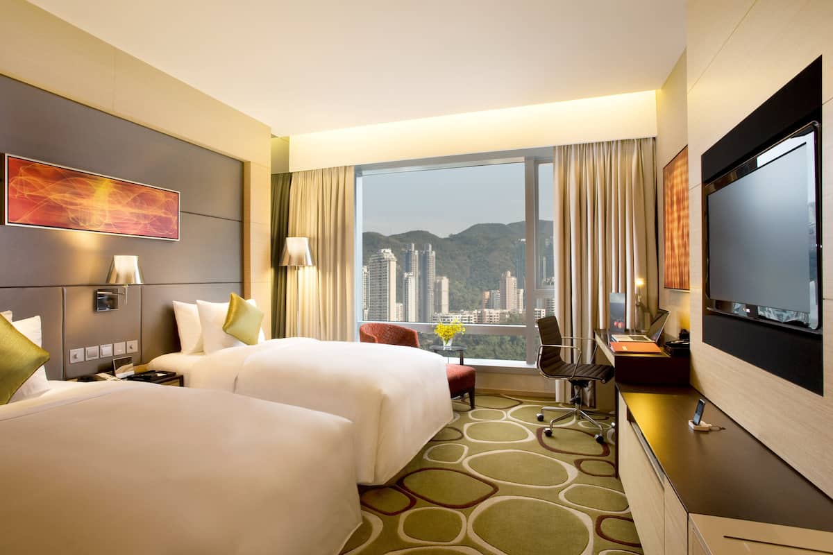 Premium bedding, down duvets, free minibar items, in-room safe