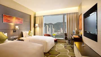 Premium bedding, down duvets, free minibar items, in-room safe