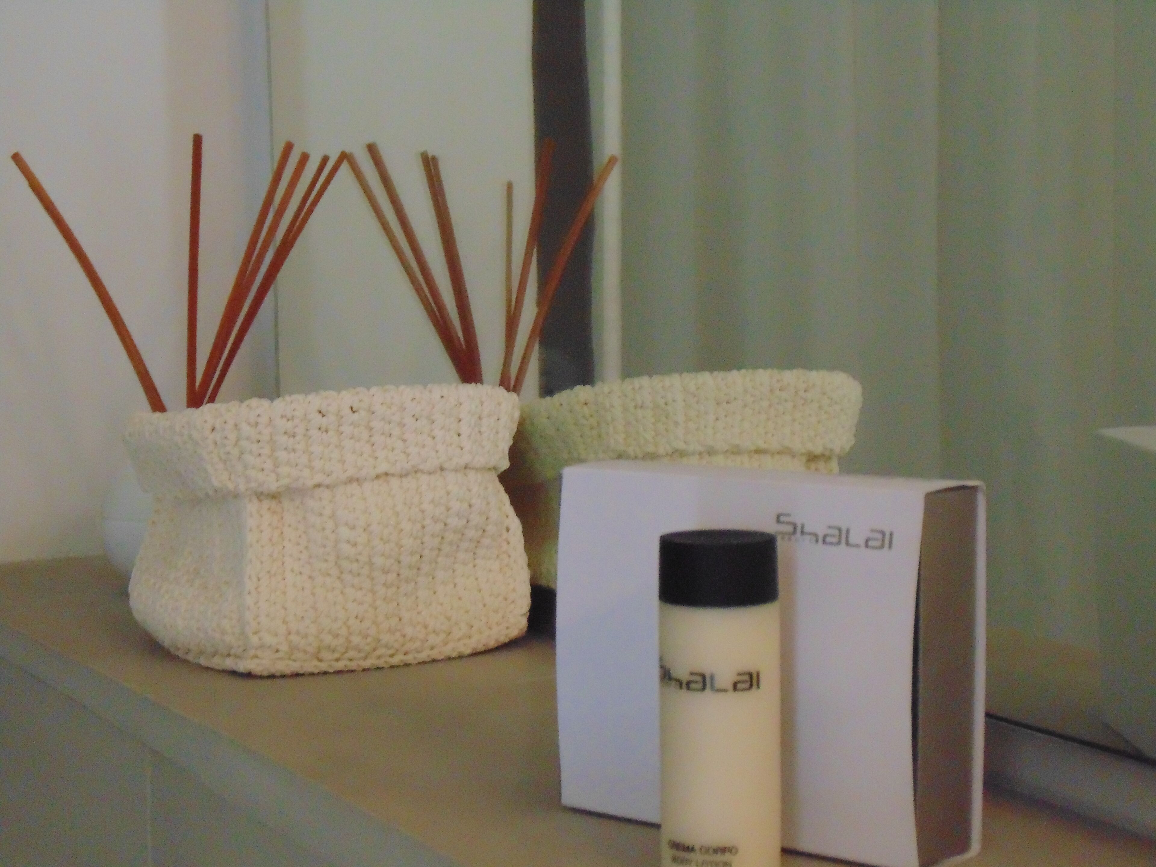 shower, hair dryer, slippers, towels