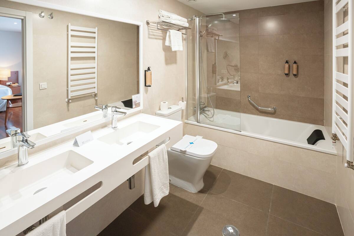 double or twin room | bathroom | deep-soaking bathtub, free toiletries, hair dryer, bidet