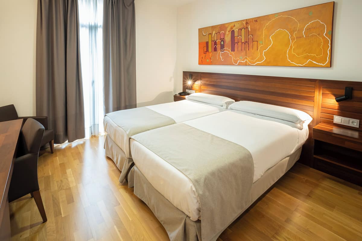 double or twin room | minibar, in-room safe, desk, free wifi