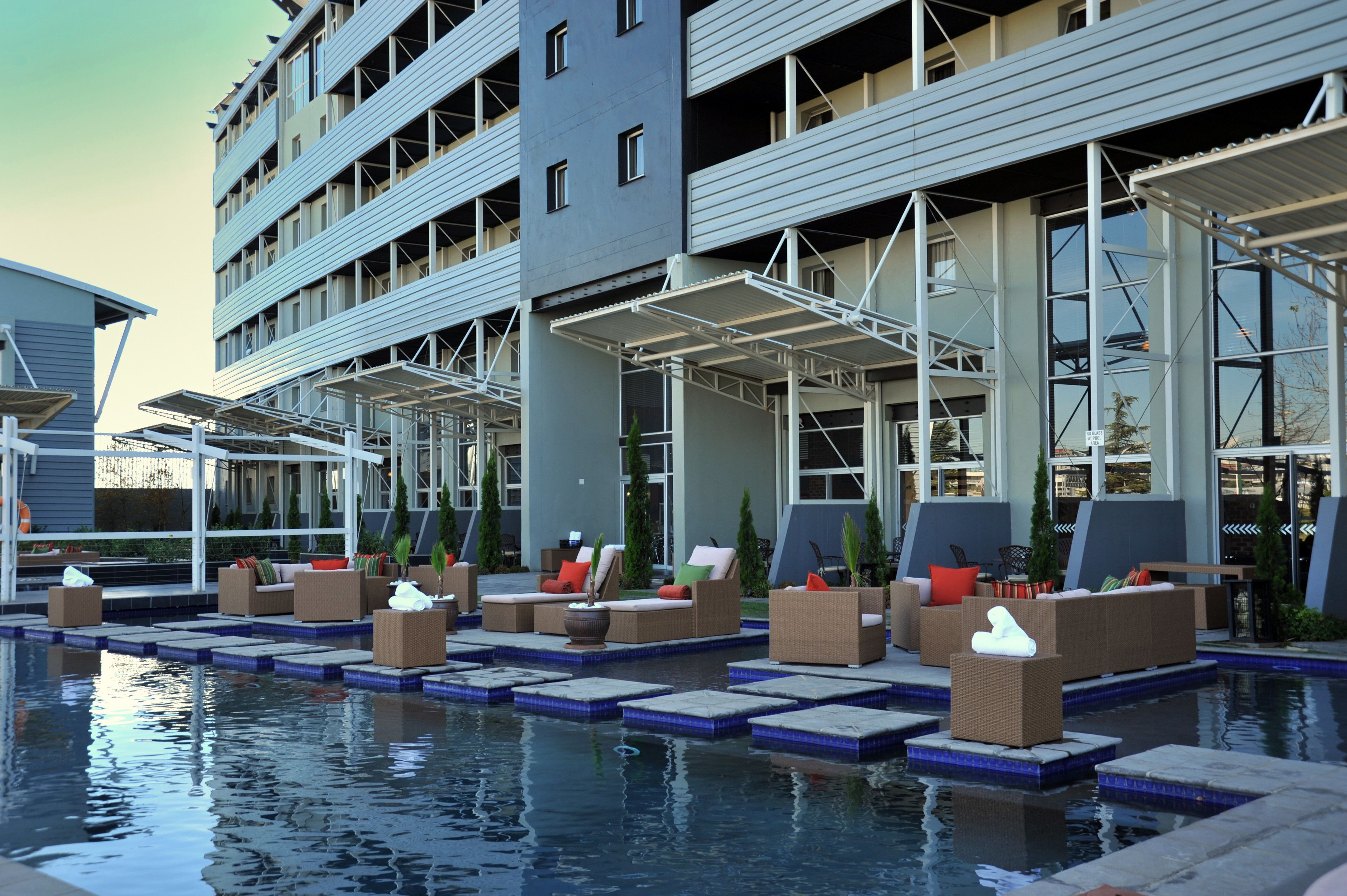 outdoor pool, pool umbrellas, pool loungers