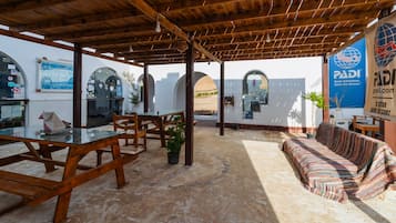 2 outdoor pools, pool umbrellas