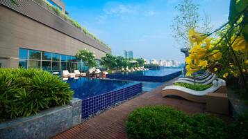 Outdoor pool, open 7:00 AM to 8:00 PM, free pool cabanas, pool umbrellas