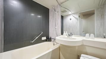 Combined shower/tub, free toiletries, hair dryer, slippers