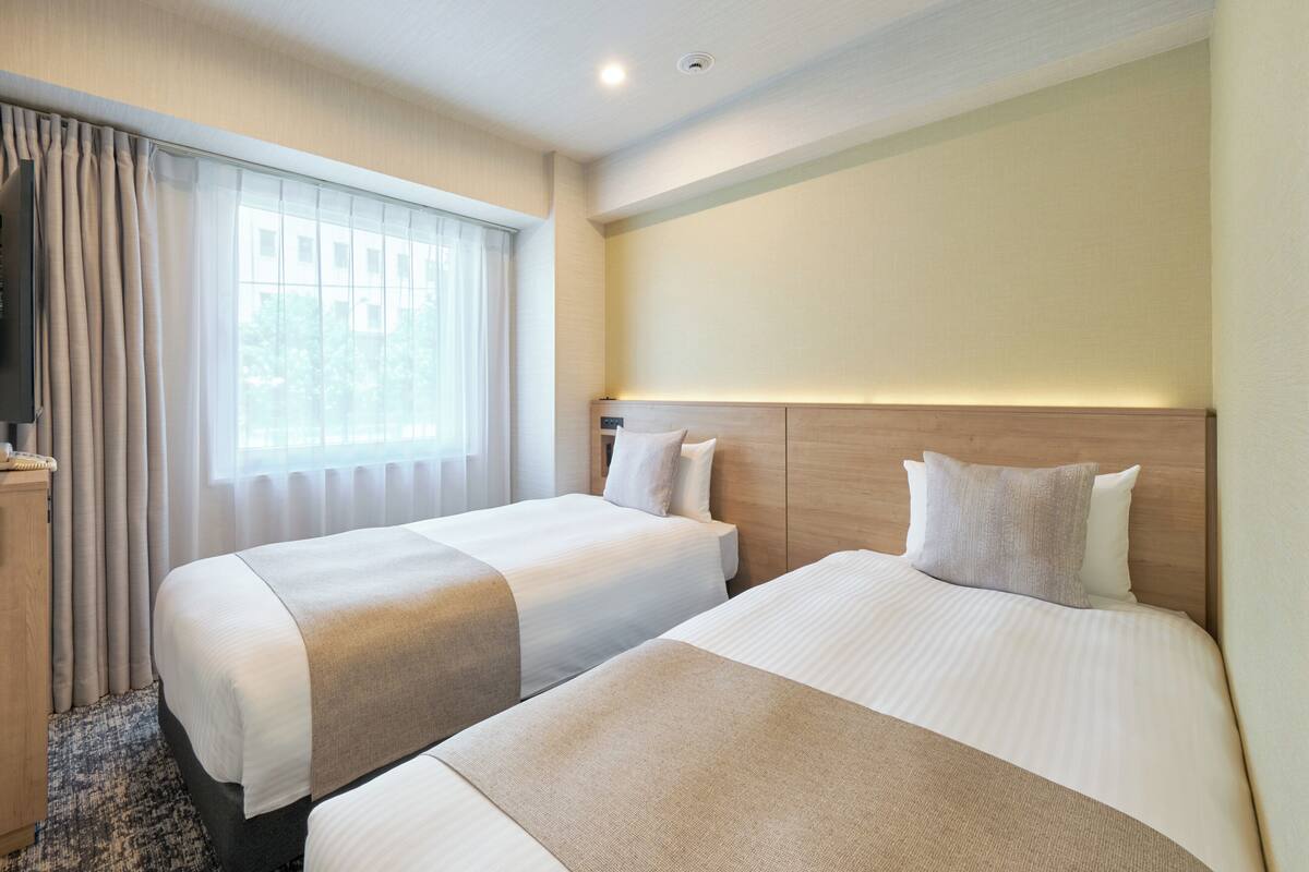 Blackout drapes, iron/ironing board (on request), WiFi (free)