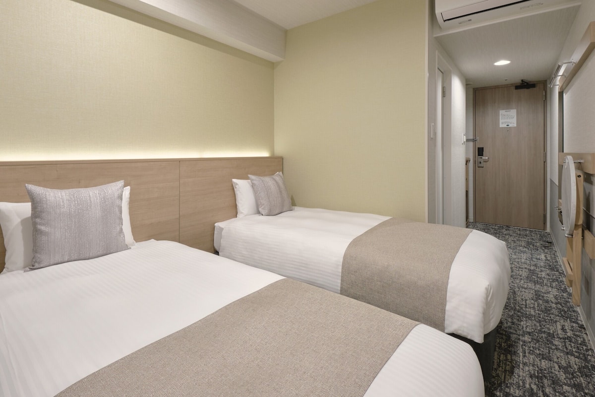 Blackout curtains, iron/ironing board, free WiFi, bed sheets