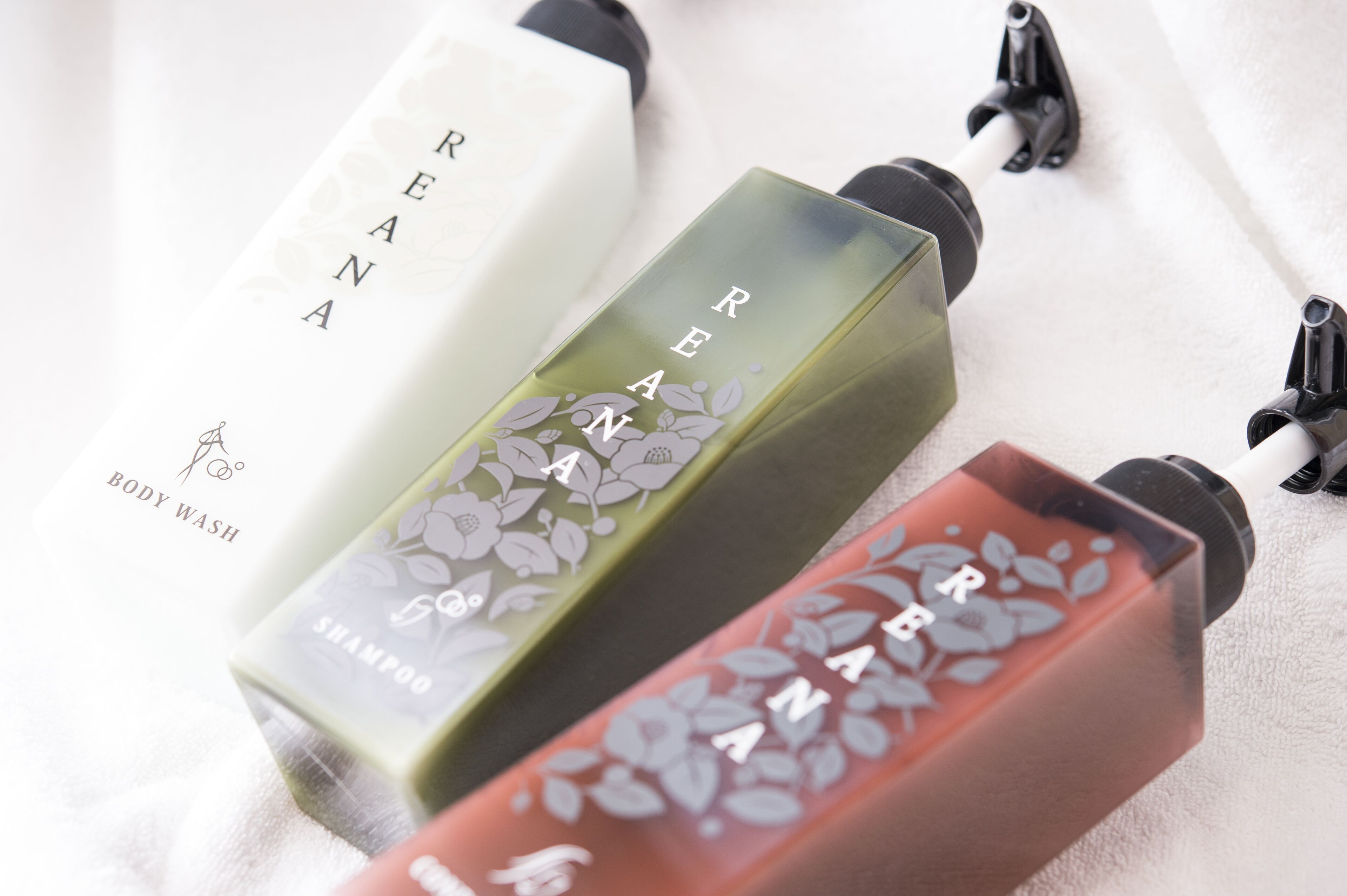 combined shower/bathtub, deep-soaking bathtub, designer toiletries