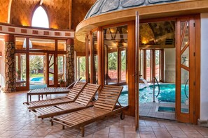 Indoor pool, seasonal outdoor pool, pool loungers