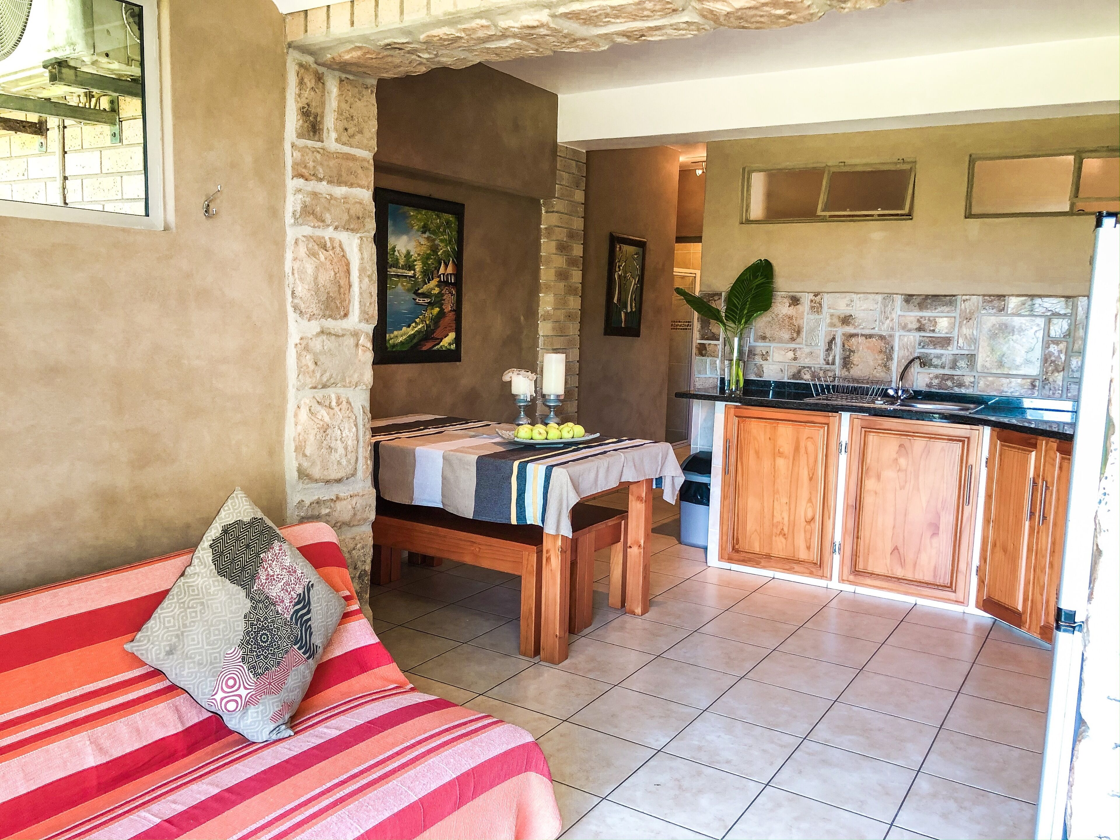 family apartment, ground floor | living area | flat-screen tv, books