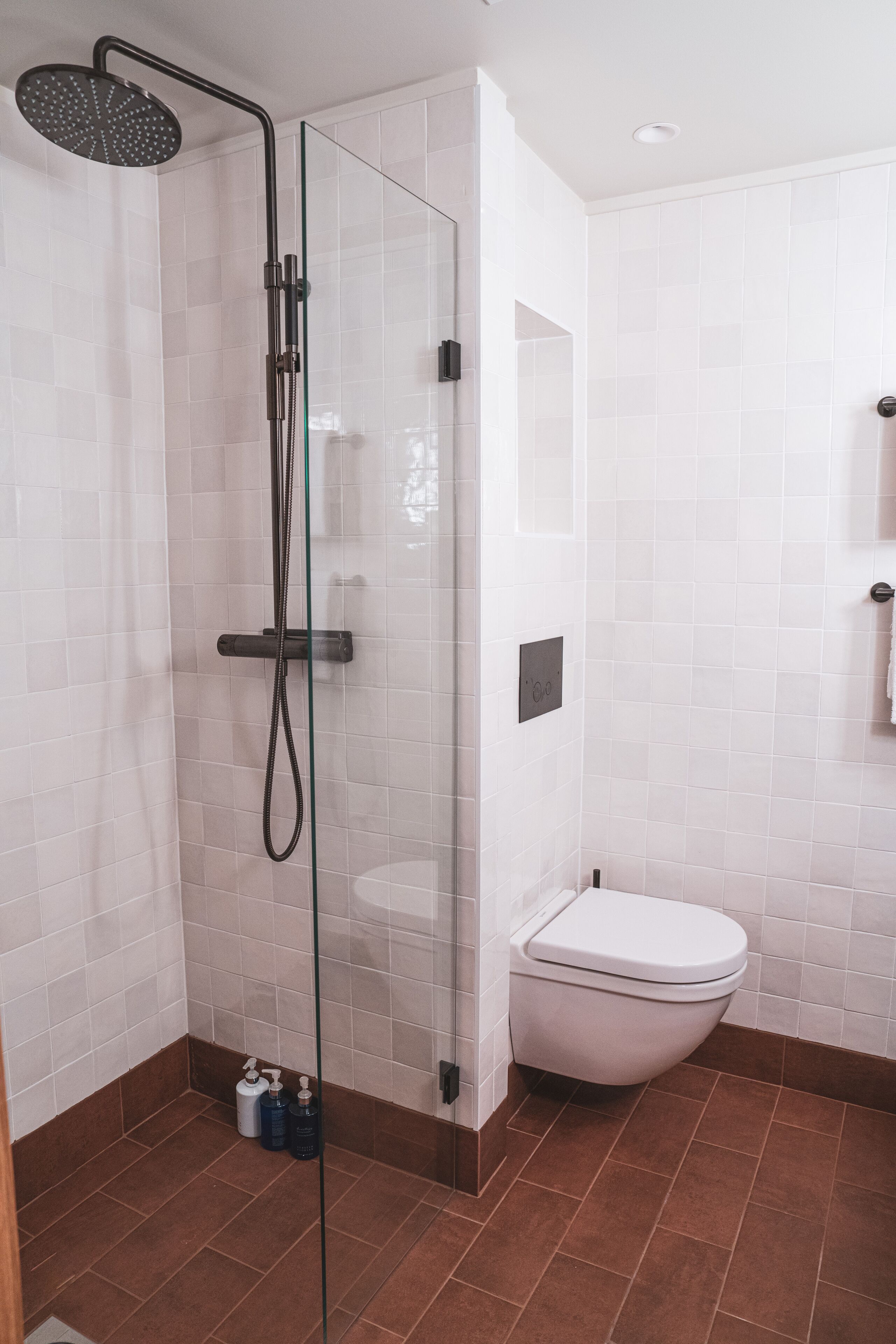 superior double room | bathroom | shower, free toiletries, hair dryer, bathrobes