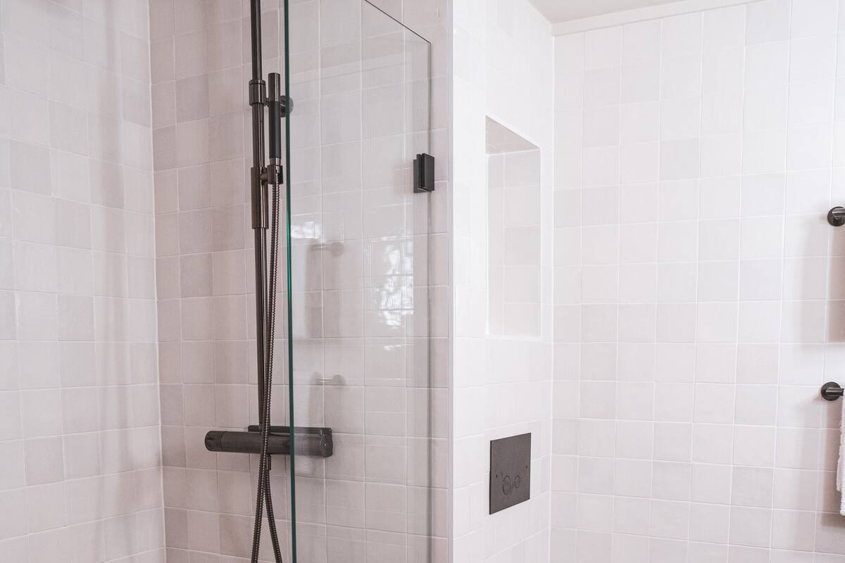 superior double room | bathroom | shower, free toiletries, hair dryer, bathrobes