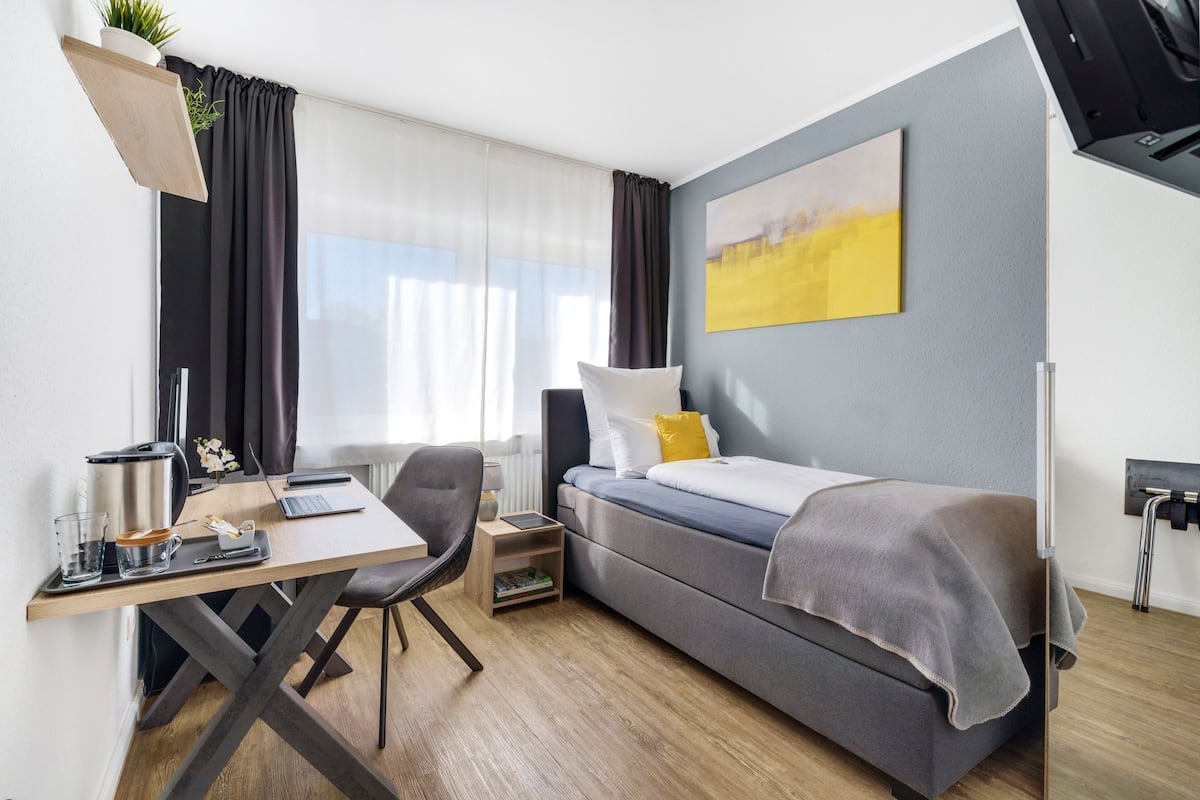 Habitación individual | Ropa de cama hipoalergénica y minibar