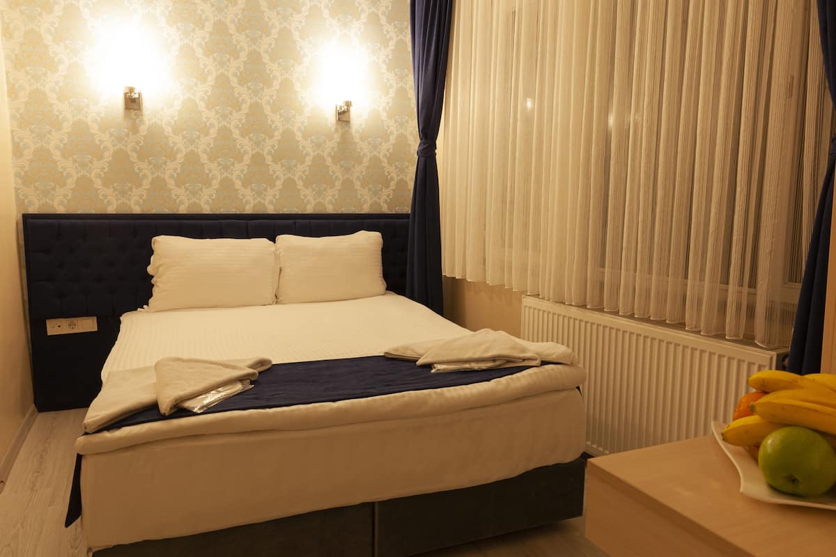 Luxe beddengoed, een minibar, gratis wifi, beddengoed
