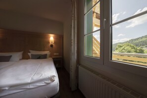 Habitació doble Comfort | Roba de llit hipoal·lergògena, minibar i caixa forta a l'habitació 