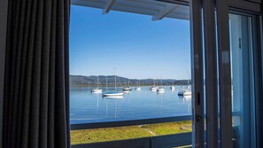 Chambre luxueuse, 1 très grand lit, vue sur l’océan | Vue de la chambre