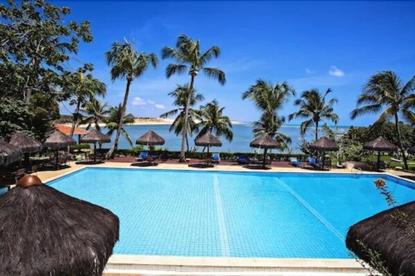 Outdoor pool, pool umbrellas, sun loungers