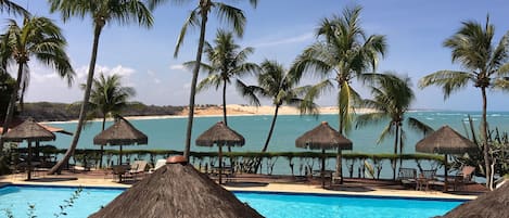 Outdoor pool, pool umbrellas, sun loungers