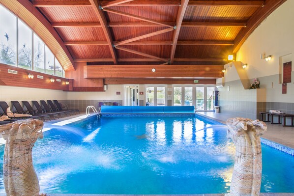 Indoor pool, seasonal outdoor pool, pool umbrellas