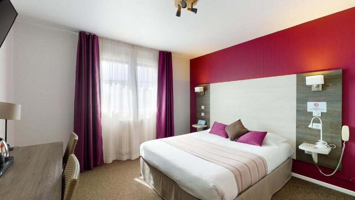 Standaard tweepersoonskamer | Select Comfort-bedden, een bureau, een laptopwerkplek, gratis wifi