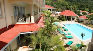 Outdoor pool, open 9:00 AM to 9:00 PM, sun loungers