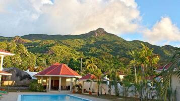 Outdoor pool, open 9:00 AM to 9:00 PM, sun loungers