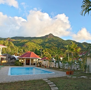 Outdoor pool, open 9:00 AM to 9:00 PM, sun loungers