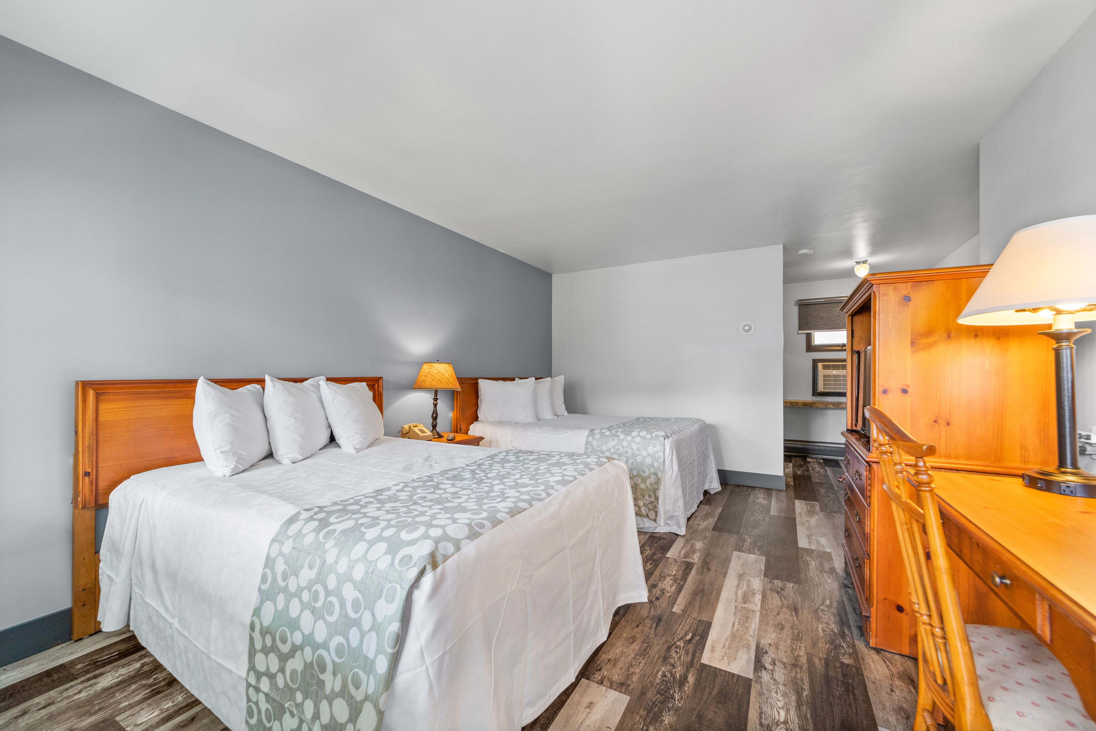 family room, multiple beds | 1 bedroom, blackout curtains, iron/ironing board, free wifi