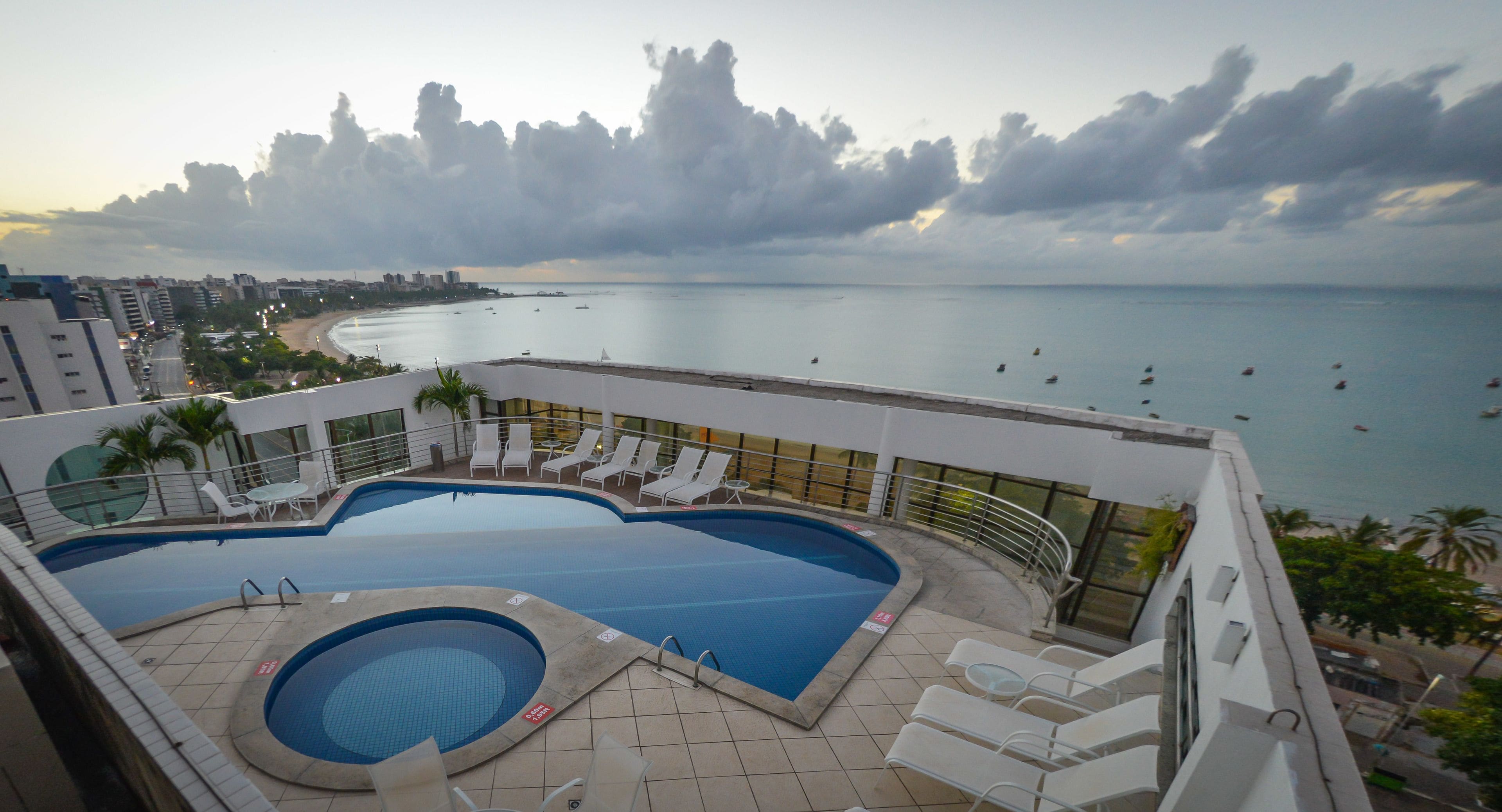 outdoor pool, open 8:00 am to 8:00 pm, pool loungers