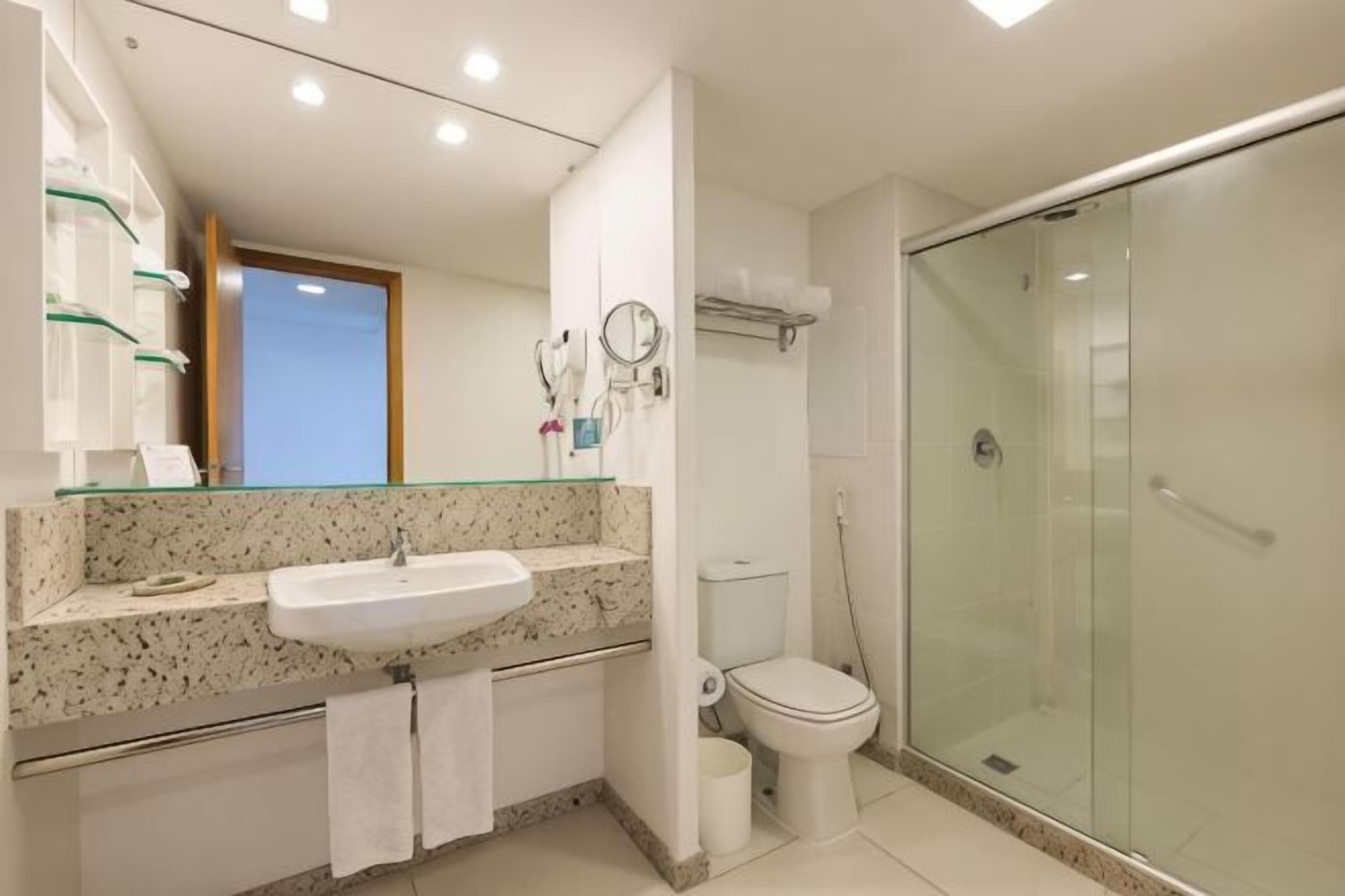 Bathroom | Shower, designer toiletries, hair dryer, bathrobes