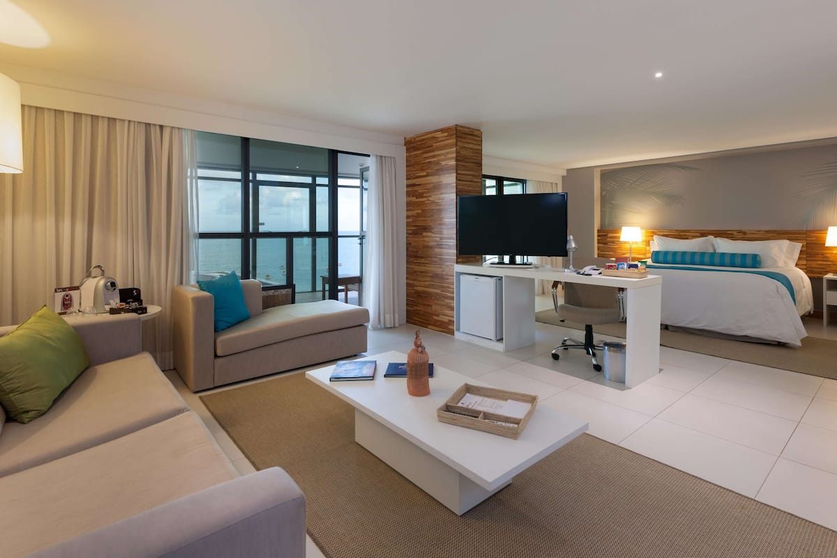 suite, 1 king bed, balcony, oceanfront | 1 bedroom, minibar, in-room safe, individually decorated