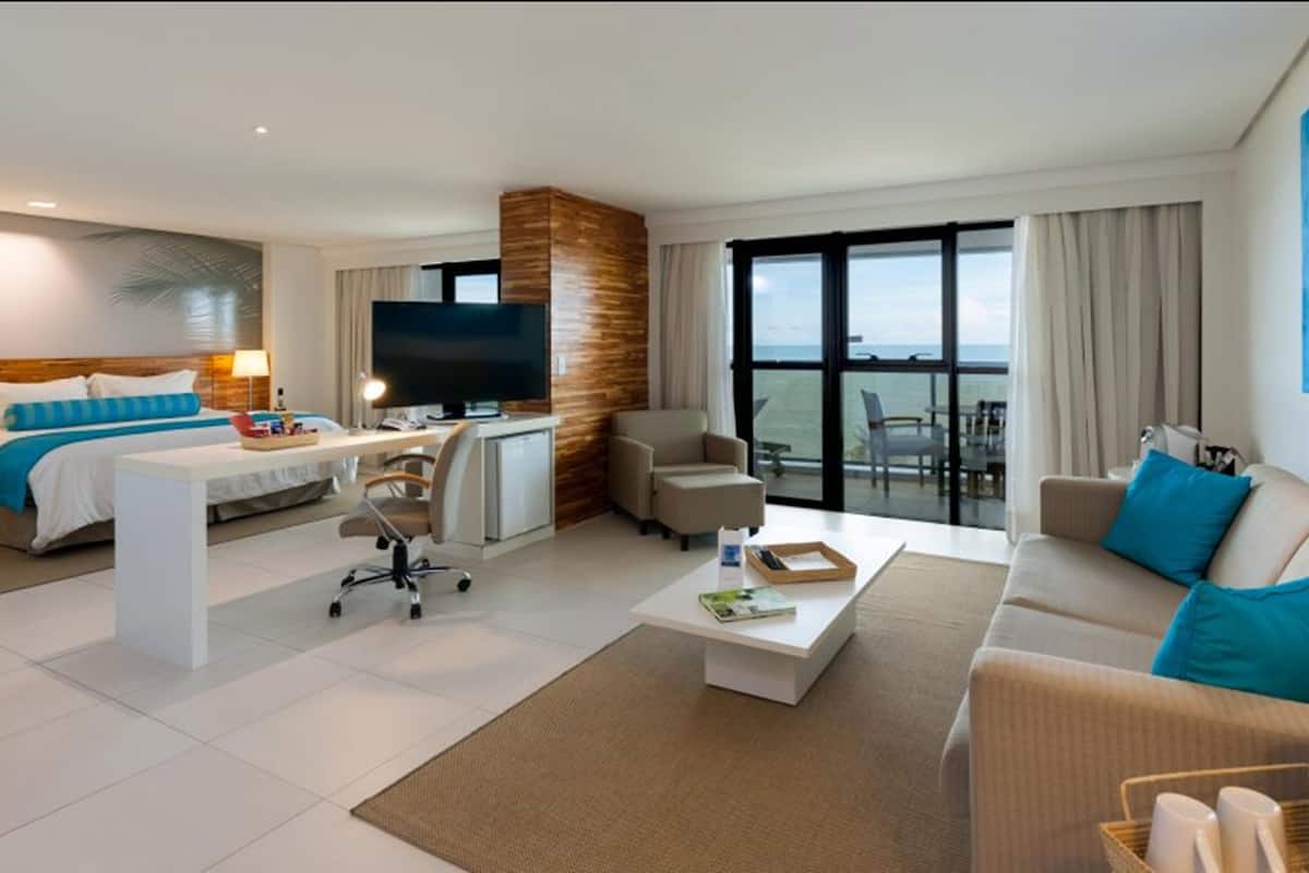 suite, 1 king bed, non smoking, balcony (living room) | 1 bedroom, minibar, in-room safe, individually decorated