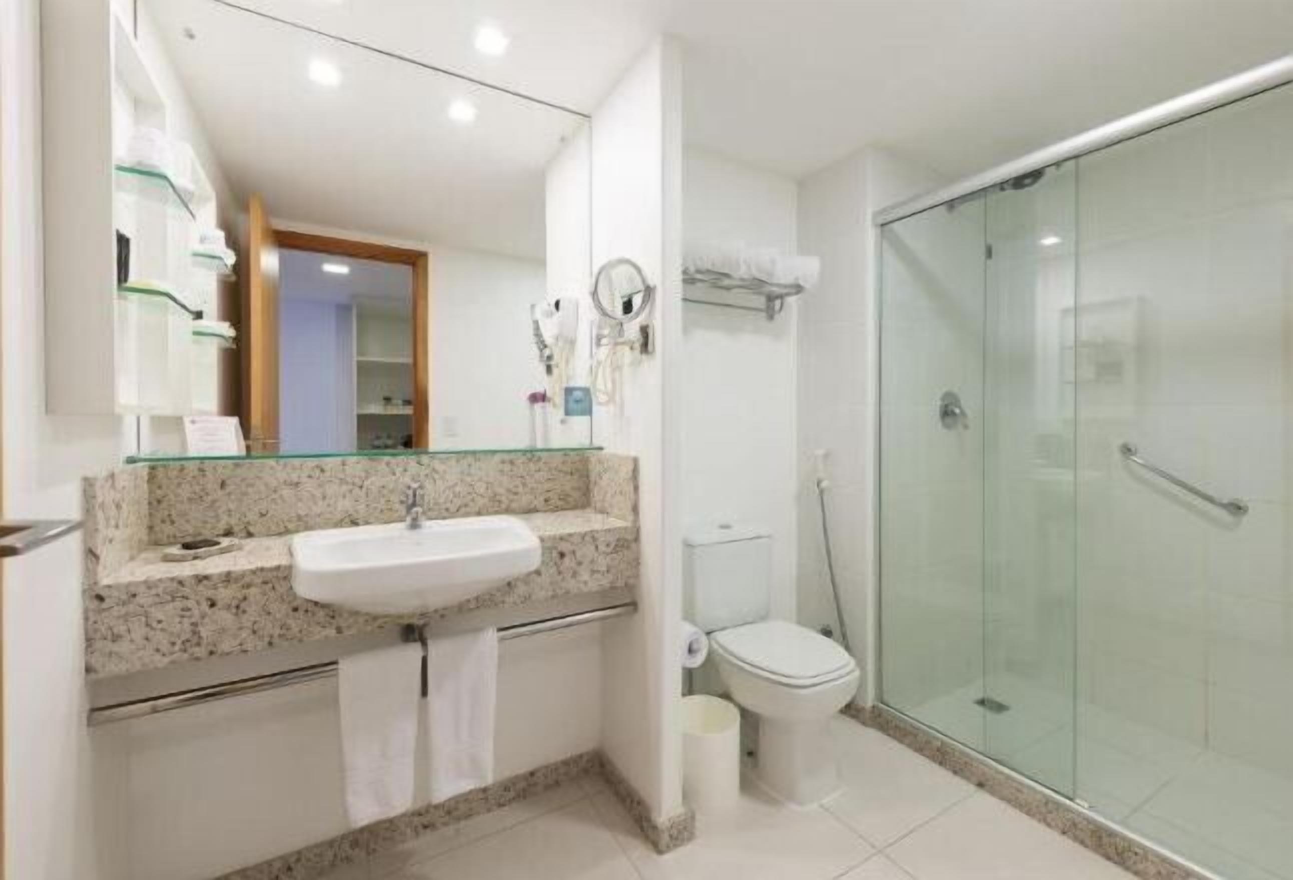 Bathroom | Shower, designer toiletries, hair dryer, bathrobes