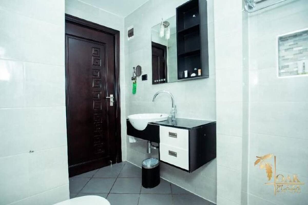 Designer toiletries, hair dryer, towels