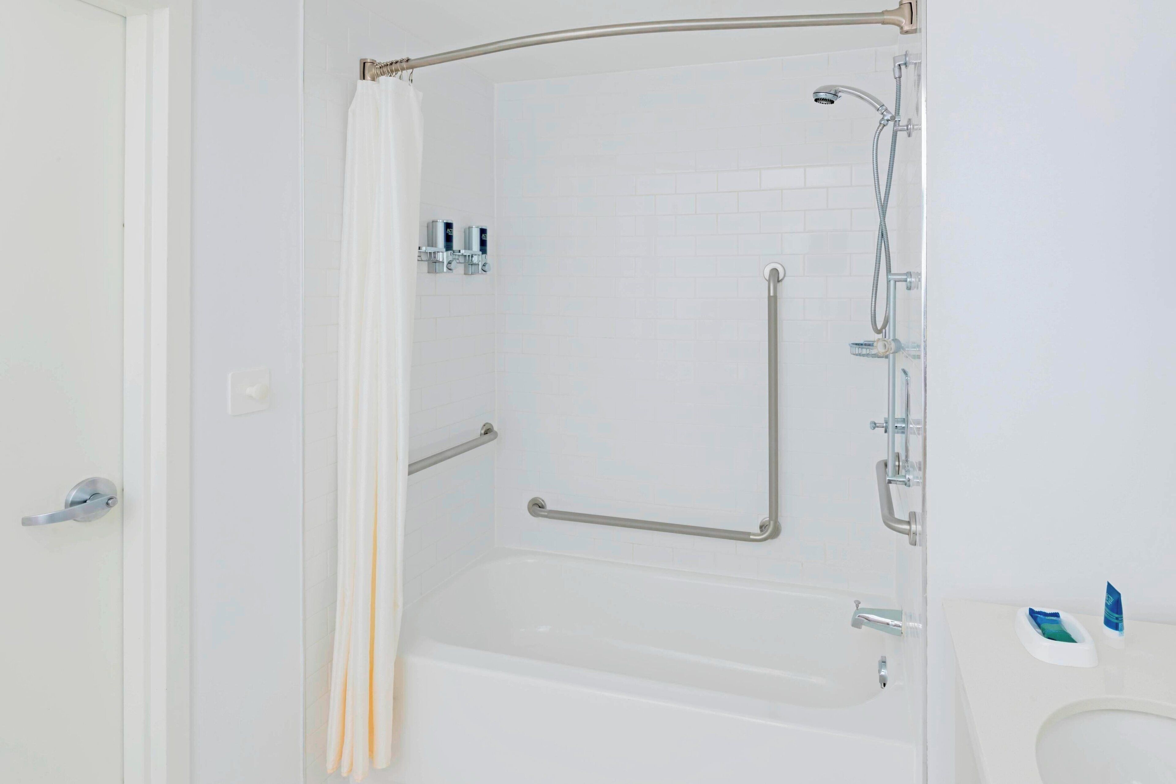 suite, 1 king bed, non smoking | bathroom | shower, free toiletries, hair dryer, bathrobes