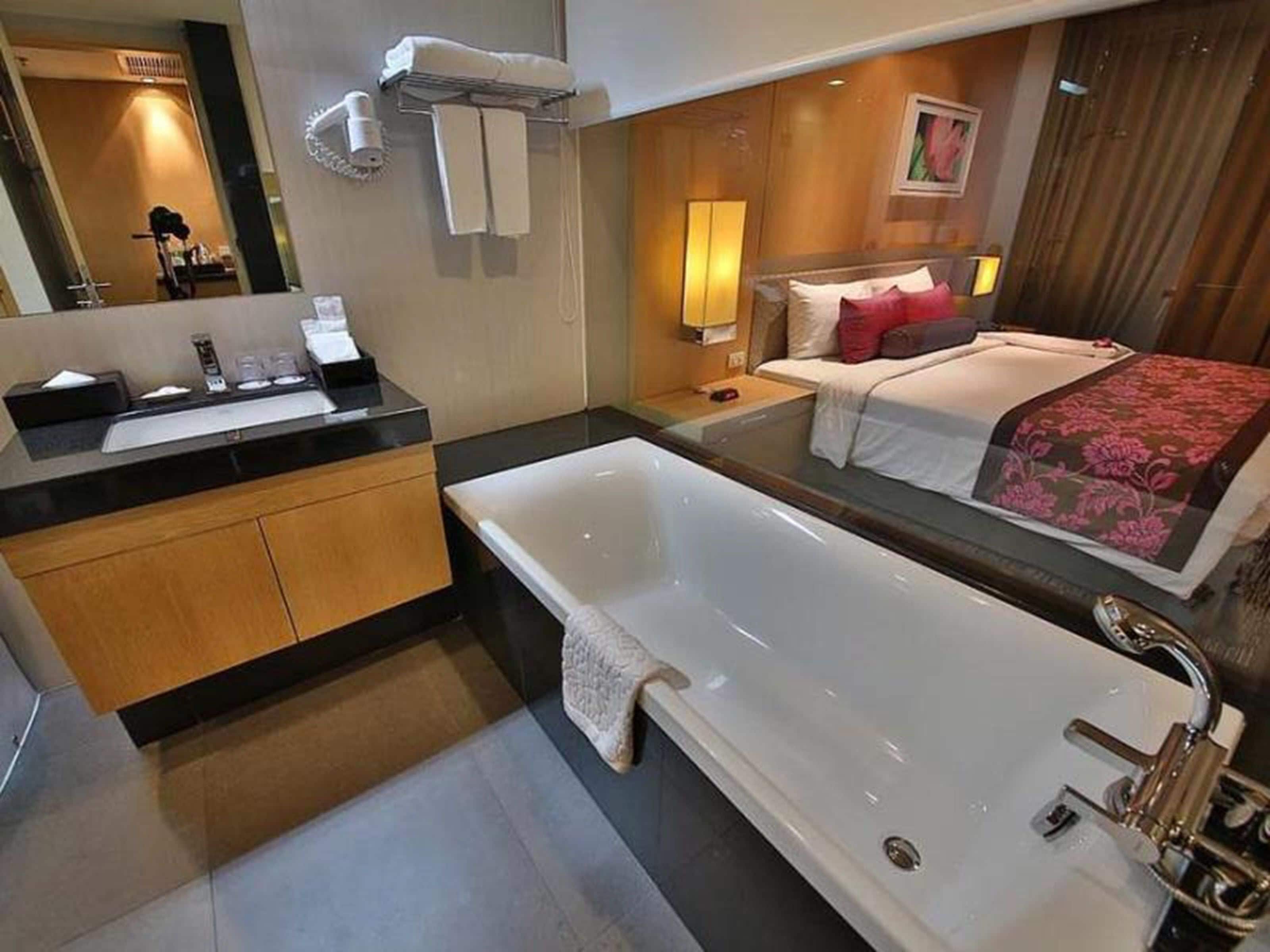 rainfall showerhead, designer toiletries, hair dryer, bathrobes