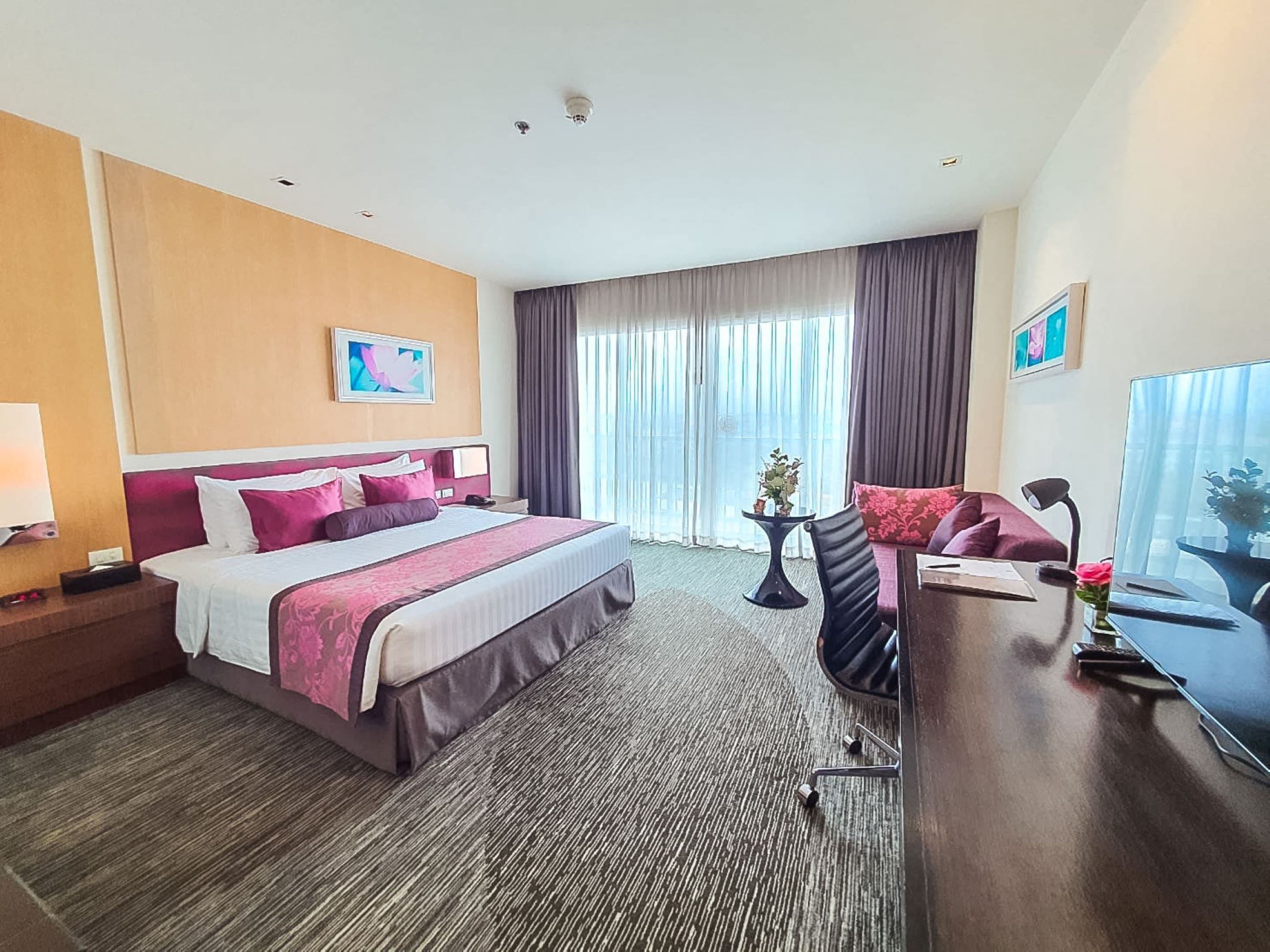 Deluxe Plus King Room with Balcony | In-room safe, desk, laptop workspace, blackout curtains