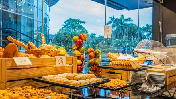 A breakfast buffet with various pastries and fruits. - Amaranth Suvarnabhumi Hotel - Free Suvarnabhumi Airport Shuttle (Bang Phli)