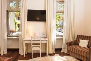 40-inch flat-screen TV with cable channels, TV