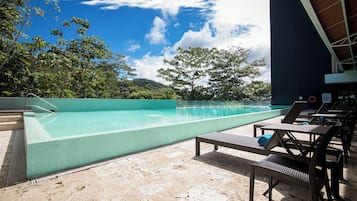 2 outdoor pools, pool umbrellas, pool loungers
