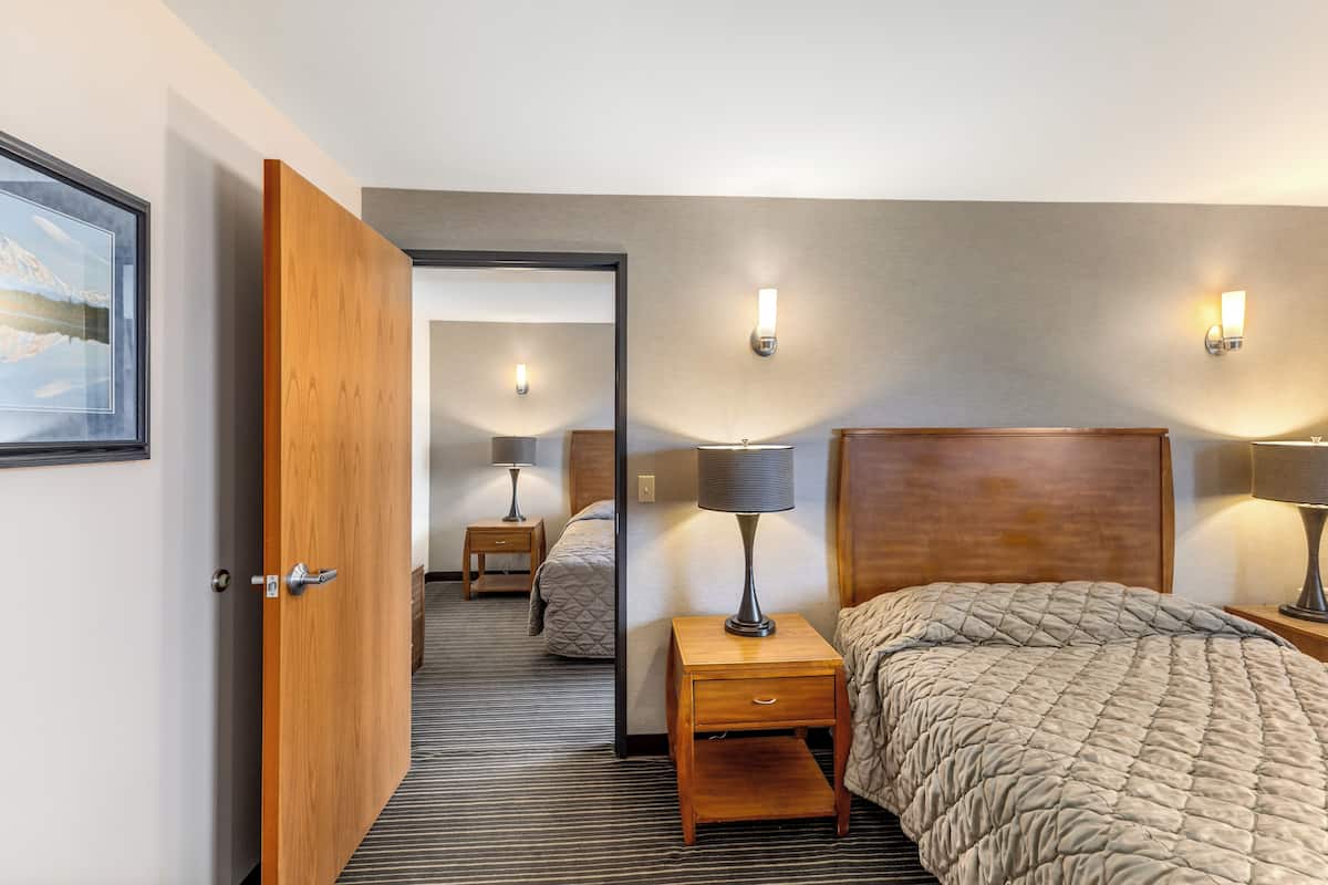 Deluxe Suite, 2 Queen Beds, Air conditioning | 1 bedroom, desk, laptop workspace, blackout drapes