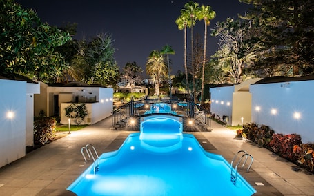 Outdoor pool, open 9:00 AM to 5:00 PM, sun loungers, lifeguards on site