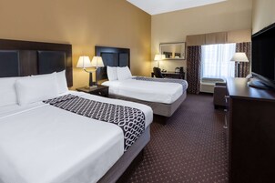 Premium bedding, pillowtop beds, desk, laptop workspace
