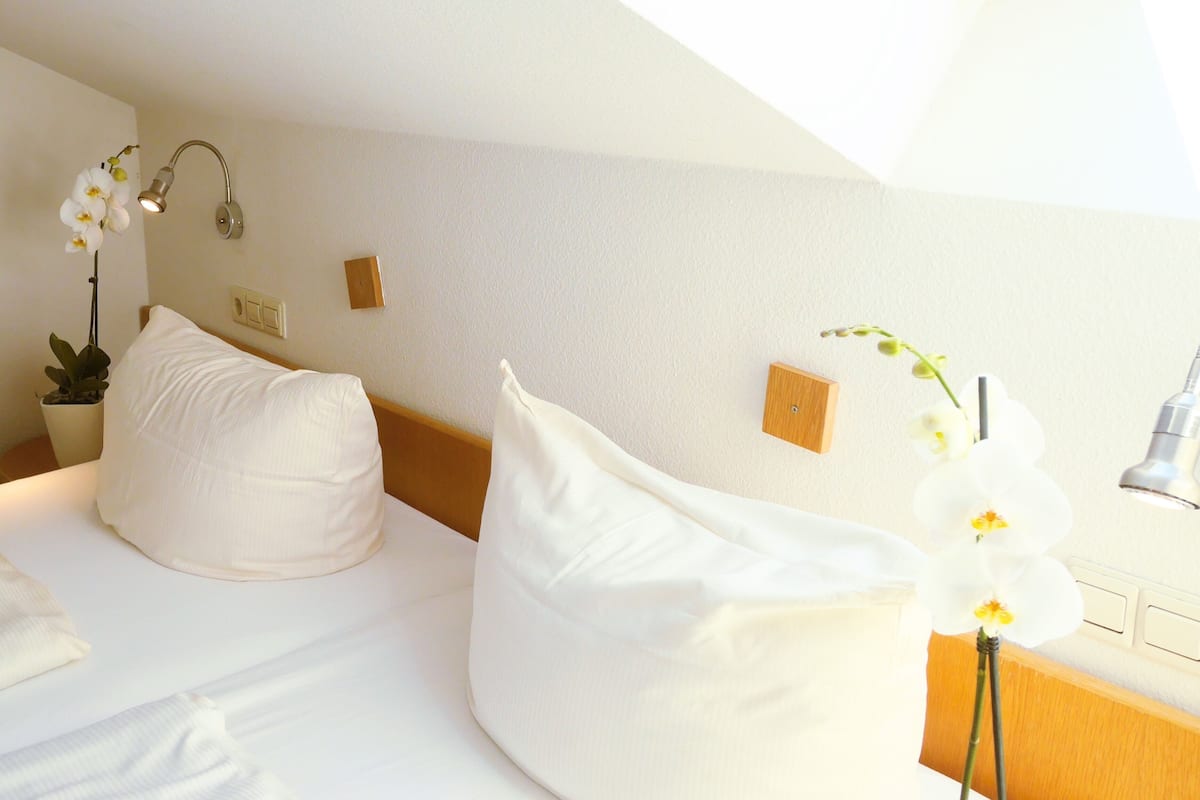 Premium bedding, down duvets, in-room safe, desk